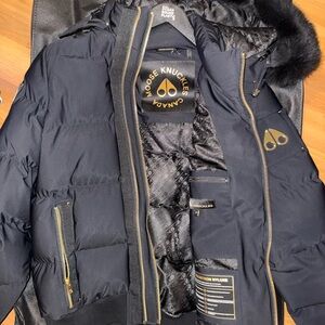 Moose Knuckles Black and Gold Puffer Jacket
